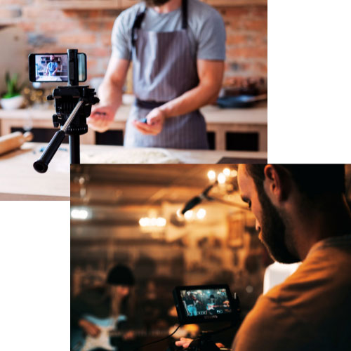 Image of a man recording himself on a phone and another professionally recording a group.