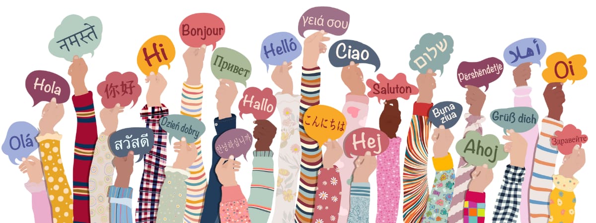Illustration of diverse hands holding colorful speech bubbles with greetings in different languages, symbolizing multilingual communication and global reach.