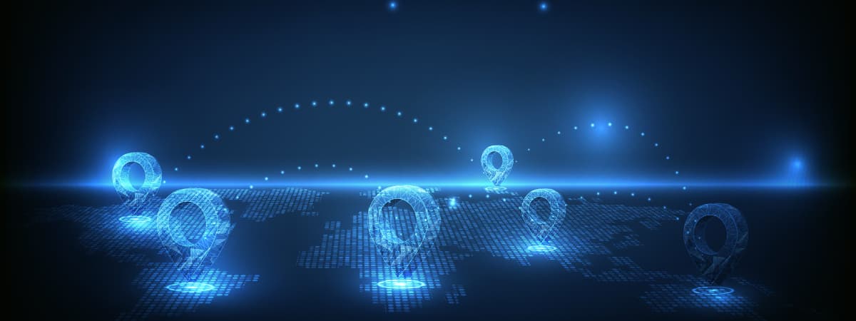 Digital world map with glowing location pins, symbolising Local SEO vs Global SEO reach.